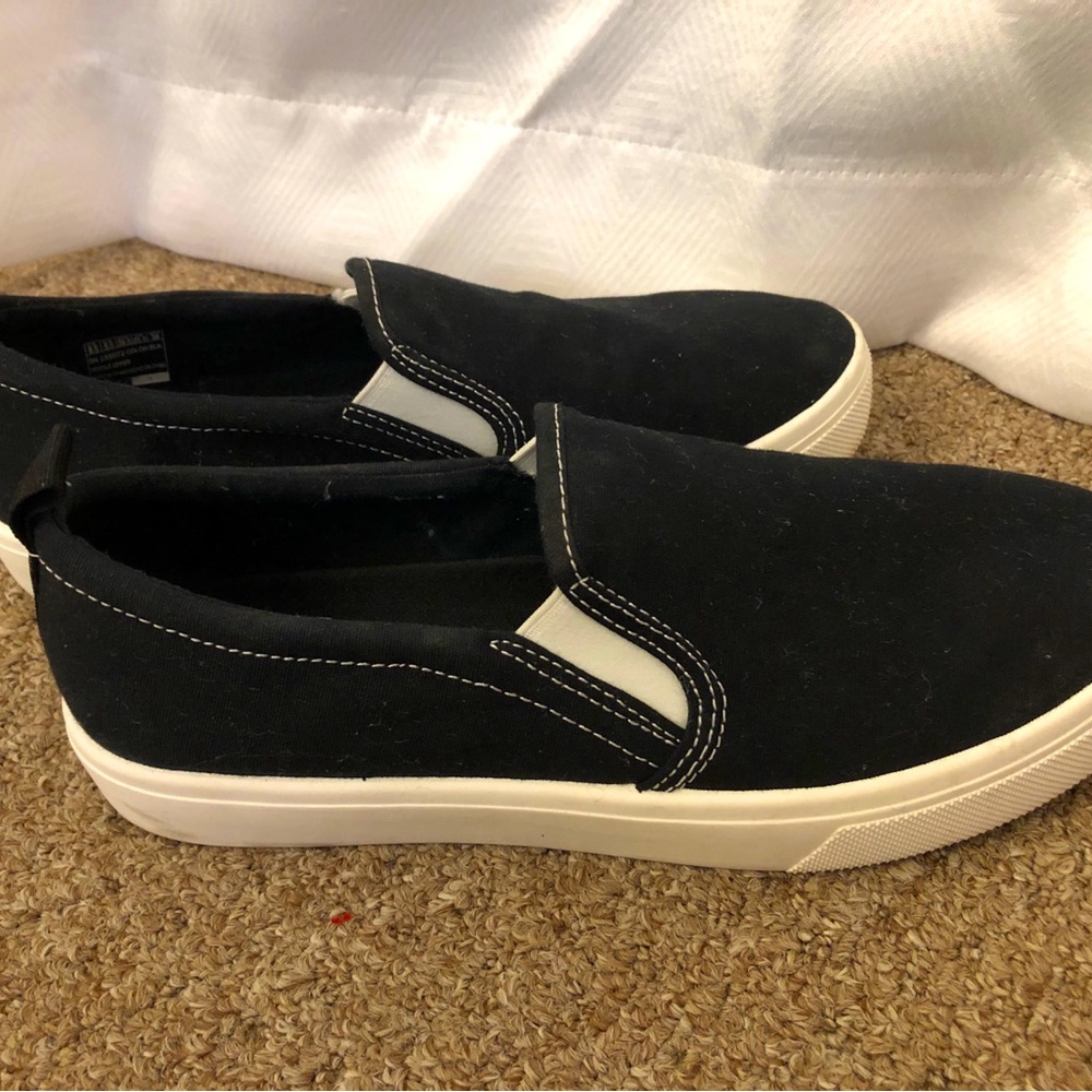 Black Sketchers. Air Cooled Memory Foam. Size 8.5. Look very similar to Vans.